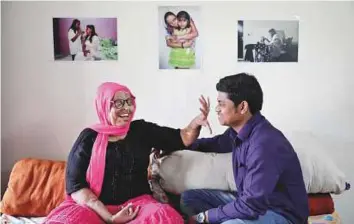  ?? Reuters ?? Pramodini Roul, 24, an acid attack survivor and a campaigner at Chhanv, an NGO that supports acid attack victims, and Saroj Sahu, 26, a manager at Chhanv with whom she got engaged.