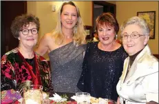  ?? NWA Democrat-Gazette/CARIN SCHOPPMEYE­R ?? Sandi Stallings (from left), Renee Plaisance, Judith Long and Linda Hillis gather at the Winter Garden Ball.