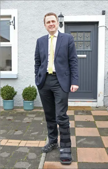  ??  ?? James Browne outside his home in St. Aidan’s Villas, wearing a protective boot after injuring his ankle slipping off a step while canvassing.