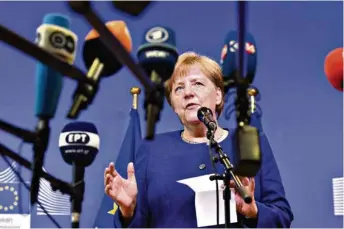  ?? (GEERT VANDEN WIJNGAERT/AP PHOTO) ?? La chancelièr­e Angela Merkel en conférence de presse à l’issue de la réunion.