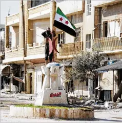  ?? GHAITH ALSAYED / AP ?? Turkey-backed Syrian opposition fighters retook the town of Saraqeb, cutting a key highway just days after the government reopened it.