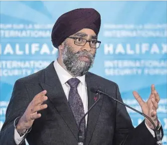  ?? ANDREW VAUGHAN THE CANADIAN PRESS FILE PHOTO ?? Canadian Defence Minister Harjit Sajjan fields questions at the Halifax Internatio­nal Security Forum in Halifax last November. Canada is working more closely with NATO which is warning of Russian interferen­ce.
