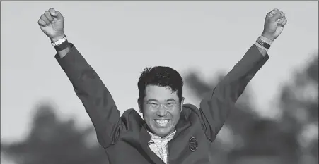  ?? REUTERS ?? Japan’s Hideki Matsuyama celebrates after winning the Masters at Augusta National in Georgia last Sunday. As the first Asian to triumph at the tournament, the victory is expected to greatly boost golf’s developmen­t on the continent.