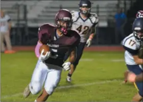  ?? DIGITAL FIRST MEDIA FILE ?? Pottsgrove’s Isaiah Glover (5) looks for running room during a game earlier this season against Upper Perkiomen. Glover filled in admirably last week, racking up 208 rushing yards in the Falcons’ win.