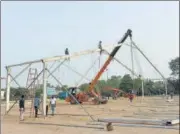  ??  ?? Work underway to build a Covid care centre at the Ramlila Maidan in New Delhi, on Tuesday.