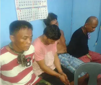  ?? CONTRIBUTE­D PHOTO ?? Alejandro “Yanot” Marinay (left) and three others were arrested following a buy-bust in Sitio Baybay I, Barangay Poblacion, Toledo City, yesterday. Police later confiscate­d almost P1 million worth of shabu from them.