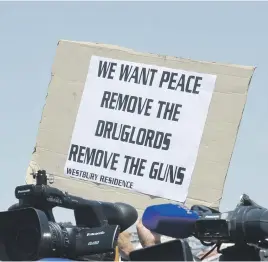  ?? Pictures: Nigel Sibanda ?? SIMMERING TENSION. Westbury residents gathered at a stadium to make their feelings known and to demand the release of five people.