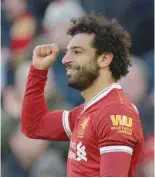  ?? — Reuters ?? Liverpool’s Mohamed Salah celebrates after scoring against West Ham United at Anfield.