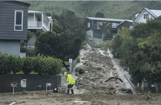  ?? BRADEN FASTIER/STUFF ?? Slips in Enner Glenn after an atmospheri­c river of rain hit Nelson in August 2022.