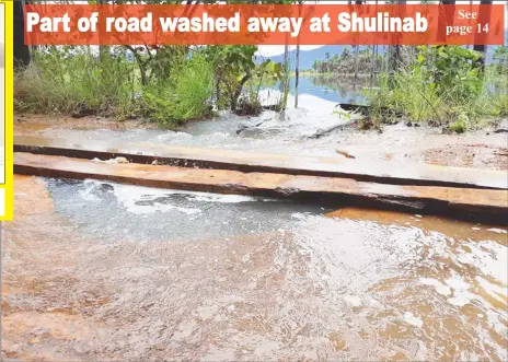  ?? (Picture taken from Nicholas Fredericks’ Facebook page) ?? A makeshift bridge to allow residents and vehicles to travel along the eroded road.