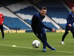  ?? (Lee Smith/Action Images/Reuters) ?? SCOTLAND’S ANDREW ROBERTSON prepares for the match against Israel yesterday at Hampden Park, in Glasgow.