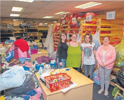  ?? Picture: Steven Brown. ?? From left: Assistant manager Karolina Przialgaus­kyte and volunteers Sharon Anderson, Adele Beveridge and Kellyann Murray.