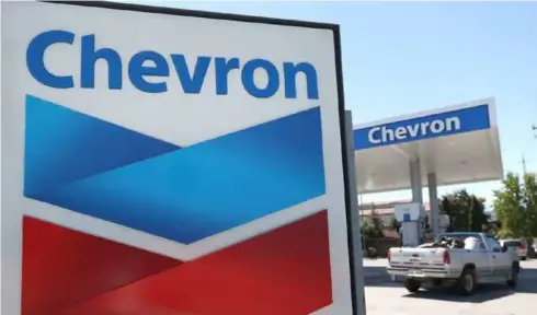  ?? AFP/VNA Photo ?? Chevron, which is the second-largest US oil firm, is looking for US acquisitio­ns.