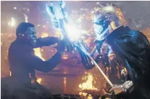  ?? Reserved. Picture: © 2017 Lucasfilm Ltd. All Rights ?? Finn (John Boyega) and Captain Phasma (Gwendoline Christie) clash.