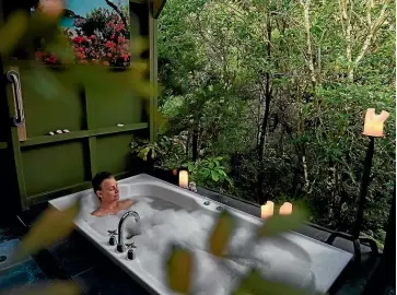  ??  ?? The treetop bath at Wairua Lodge was the perfect place to unwind.