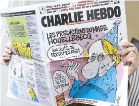  ??  ?? The office of the weekly Charlie Hebdo was targeted.