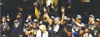  ??  ?? KEVIN DURANT (2nd L) celebrates as NBA Finals Most Valuable Player while Stephen Curry (3rd L) holds the Larry O’Brien Trophy after of the Golden State Warriors defeated the Cleveland Cavaliers during Game Four of the 2018 NBA Finals at Quicken Loans...