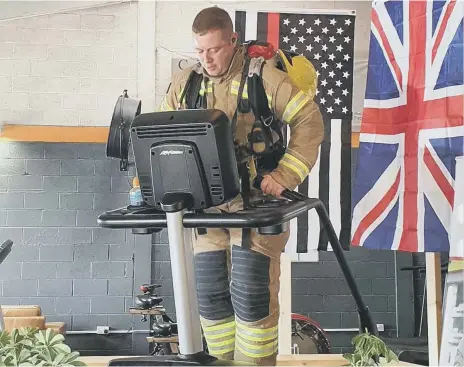  ??  ?? Firefighte­r Chris Smith did the climb to honour those who lost their lives in the 9/11 terrorist attacks.