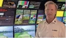  ?? CLAYTON FREEMAN/FLORIDA TIMES-UNION ?? NBC lead golf producer Tommy Roy speaks in the main PGA Tour Fleet truck at The Players Championsh­ip.