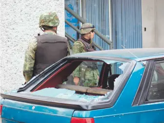  ?? FOTOS: CUARTOSCUR­O/ARCHIVO ?? El 15 de diciembre de 2009, dos ataques con granadas en Morelia, Michoacán