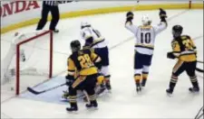  ?? GENE J. PUSKAR — THE ASSOCIATED PRESS ?? Nashville’s Colton Sissons (10) celebrates his goal against the Penguins during the third period in Game 1 of the Stanley Cup Finals Monday in Pittsburgh.