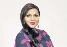  ?? Emily Berl / New York Times ?? Mindy Kaling shared the news that she had recently given birth while appearing on “The Late Show with Stephen Colbert” Thursday. She joked that she was offended paprazzi photograph­ed her but didn’t know she was pregnant.