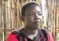  ?? — AFP ?? Nunu Diana, a social worker and mother of four, poses at her house in Lemon Gaba, near Juba.