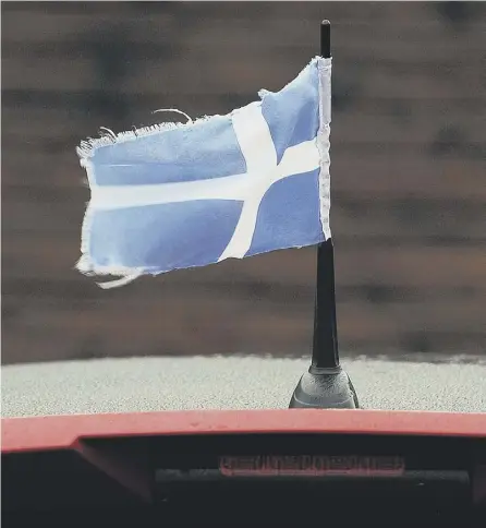  ?? PICTURE: ANDY BUCHANAN/GETTY ?? 0 Flags like those of Shetland give a sense of identity to different Scottish communitie­s