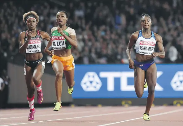  ?? — GETTY IMAGES ?? Canada’s Crystal Emmanuel, Ivory Coast’s Marie-Josee Ta Lou and Britain’s Dina Asher-Smith compete in the semifinal of the women’s 200 metres at the world track and field championsh­ips at the London Stadium on Thursday.