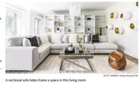  ?? SCOTT MORRIS Design Recipes/TNS ?? A sectional sofa helps frame a space in this living room.