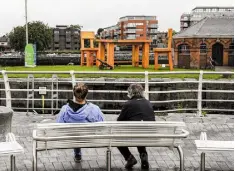  ??  ?? BIG IDEA: Fork and spoons on Limerick lamp posts (left), the giant table and chairs by the river Shannon (above) and (inset below) Celia Larkin, Limerick’s new city revitalisa­tion manager