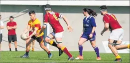  ??  ?? Rebecca Mahoney wearing an unique purple uniform to celebrate women’s suffrage during the first senior first class rugby match controlled by a woman referee in New Zealand on Saturday September 15.