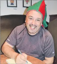  ?? SALLY COLE/THE GUARDIAN ?? Melvin Ford is making a grocery list and checking it twice. This year he’s inviting Islanders to his annual Christmas dinner at St. Mary’s Hall in Souris.