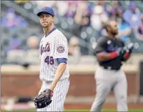  ?? John Minchillo / Associated Press ?? New York Mets starting pitcher Jacob degrom won the Cy Young Award in both 2018 and 2019, but since the start of the 2018 season, he’s just 25-20 despite posting a stellar 2.06 ERA.