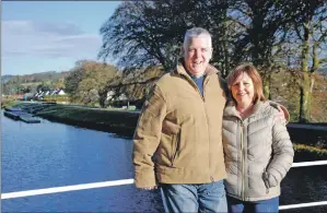  ?? 06_a46dougie0­2 ?? Dougie Philand and his wife Libby at a favourite walking spot on the Crinan Canal.