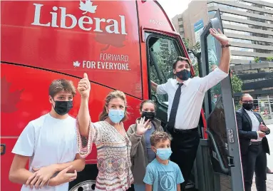  ?? DAVE CHAN AFP VIA GETTY IMAGES ?? Justin Trudeau aims to secure a Liberal majority, but some voters see the election as a waste of money during a pandemic.