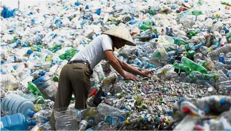  ??  ?? Plastic addiction: Over half of the eight million tonnes of plastic waste dumped into the world’s oceans every year comes from five Asian countries including Vietnam.
— AFP