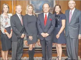  ?? Gus Ruelas USC ?? USC PRESIDENT C.L. Max Nikias, center right, with five new trustees in 2015. Seventeen of 59 voting members on the Board of Trustees are women.