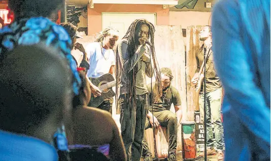  ?? CONTRIBUTE­D PHOTOS ?? Ras-I on the mic during sound check for Strictly Roots at House of Dancehall during Kingston Music Week 2019.
