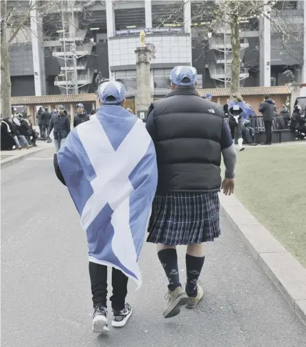  ??  ?? 0 Many Scottish fans will embrace the Saltire on Saturday at Murrayfiel­d (Picture: Ian Rutherford)
