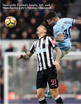  ??  ?? Newcastle United's Joselu, left, and Manchester City's Nicolas Otamendi