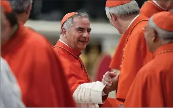  ?? ANDREW MEDICHINI, FILE — THE ASSOCIATED PRESS ?? Cardinal Angelo Becciu inside St. Peter’s Basilica at the Vatican in 2022.