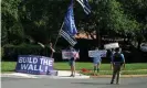  ?? Photograph: Stefani Reynolds/EPA ?? Supporters of and protesters against Donald Trump gather outside Trump National Golf Club in Sterling, Virginia, on Saturday.