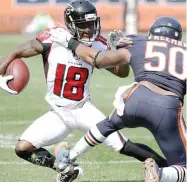  ?? AP ( LEFT), GETTY IMAGES ?? Tight end Trey Burton ( left) and receiver Taylor Gabriel will play pivotal roles in coach Matt Nagy’s offense.