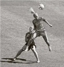  ??  ?? The Dash’s Rachel Daly, right, earned the Golden Boot as the competitio­n’s leading scorer. She assisted on Shea Groom’s goal.