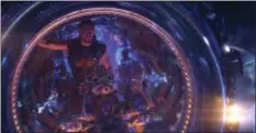  ??  ?? Chris Hemsworth’s Thor. Rocket (voiced by Bradley Cooper), seated center, and Groot (voiced by Vin Diesel) share a mission in “Avengers: Infinity War.”