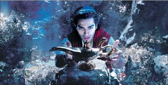  ?? Photograph­s from Disney Enterprise­s Inc. ?? MENA MASSOUD plays the title role in Disney’s live-action “Aladdin,” coming out May 24 and also starring Will Smith. Will audiences like this whole new world?