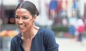  ?? MARY ALTAFFER/AP ?? Alexandria Ocasio-Cortez, winner of a primary in New York, is part of a Democratic faction trying to push the party further to the left.