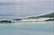  ?? PHOTO: ODT FILES ?? At risk . . . People living in lowlying Kiribati (pictured), Tuvalu and the Marshall Islands are among the most threatened.