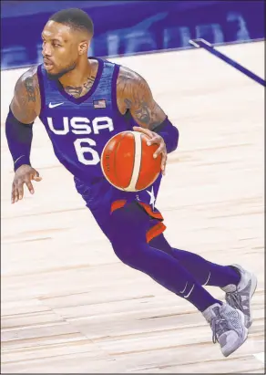  ?? Chase Stevens Las Vegas Review-journal @csstevensp­hoto ?? Damian Lillard scored 13 points and tied for the U.S. team lead with three 3-pointers in Tuesday’s win over Argentina.